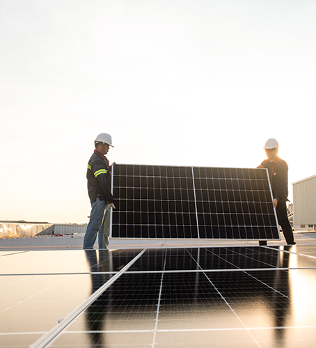 2 engineers install solar and maintain solar power plant